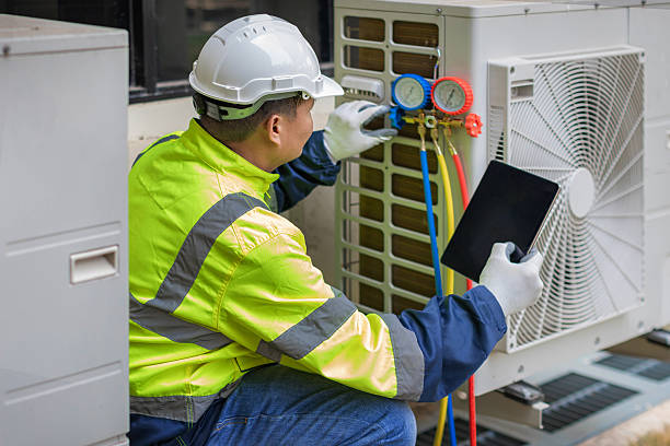 Professional Hvac technician working in Oak City, NC
